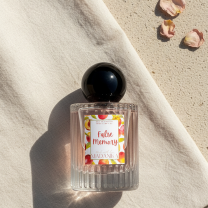 False Memory — A moment you don’t remember living | Dark plum, rose & smoky oud